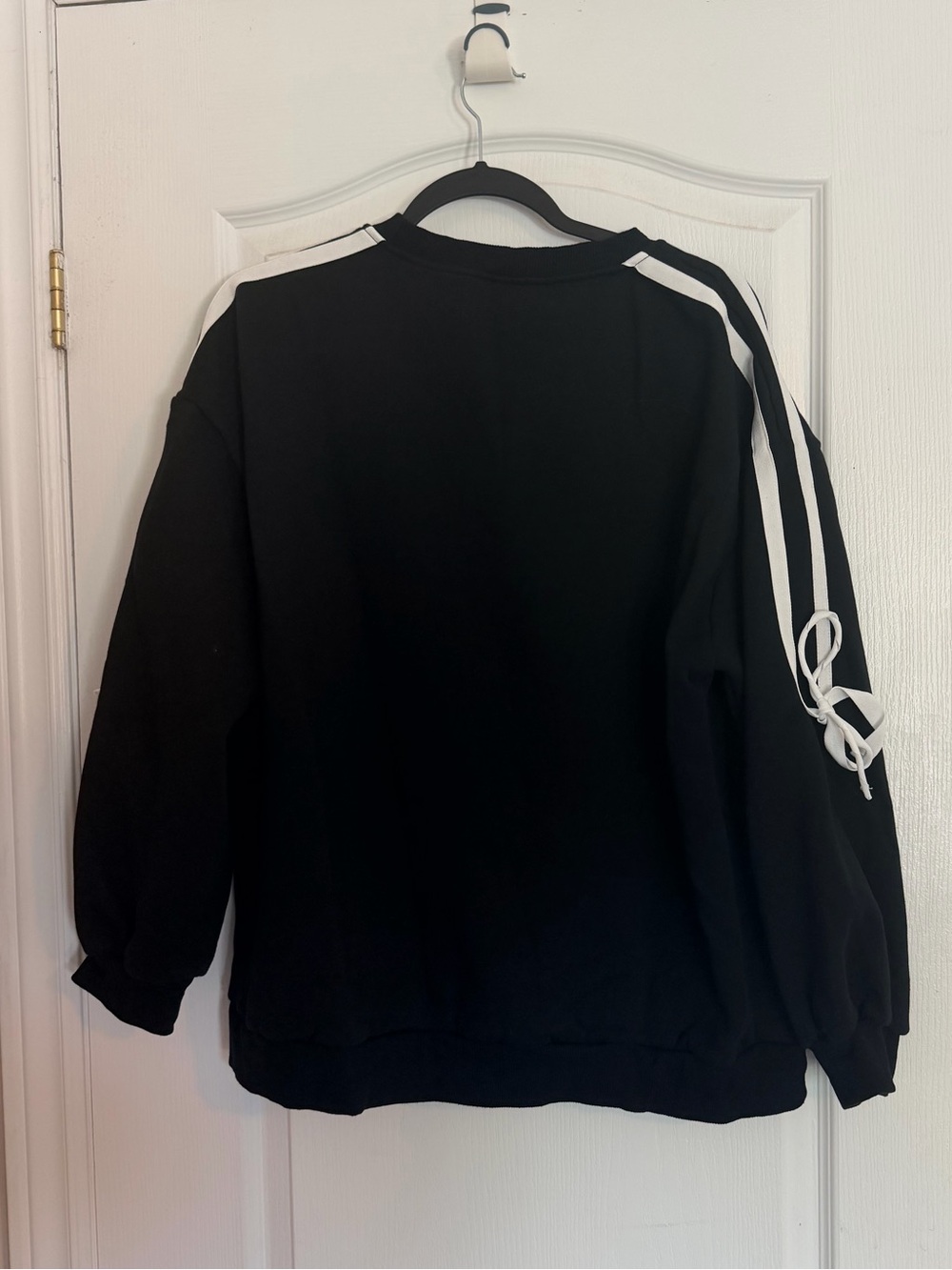 Black Crewneck Sweater with White Shoulder Stripes and bows